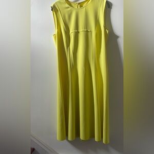 Stylish sheath dress with raw-edge detailing.